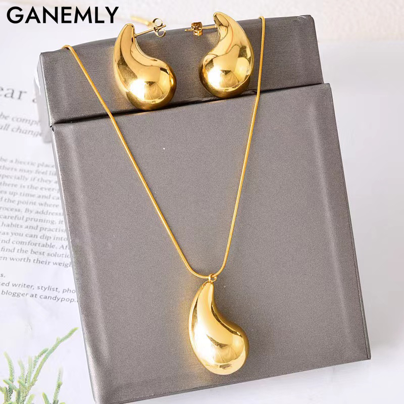 GANEMLY SION L-Ensemble collier et boucles d'oreilles en acier inoxydable pour femme, bijoux à breloques étanches, goutte d'eau creuse, carillon, or, document Bergame AI0001