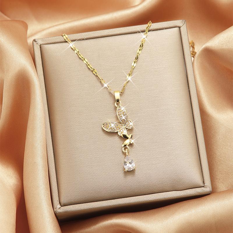 Collier en acier au titane avec pendentif pompon pour femme, simple et attrayant AI0001